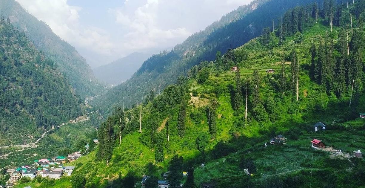 Shilha Village in the Parvati Valley, surrounded by green mountains