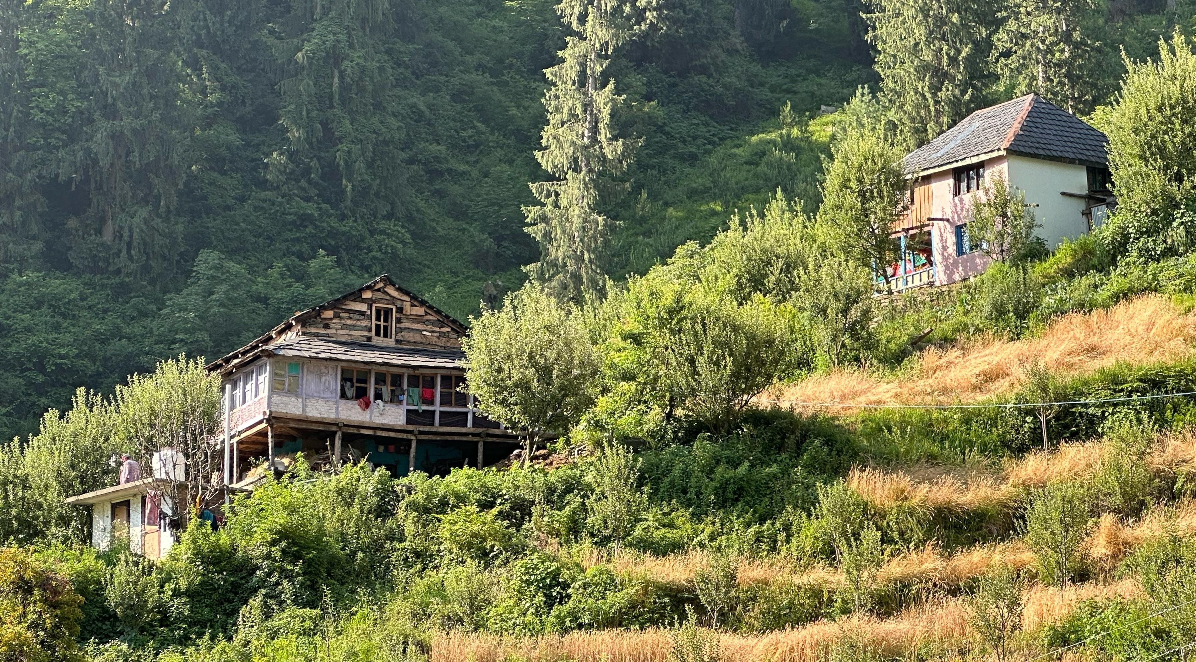 Traditional Himachali houses on the slopes above the valley